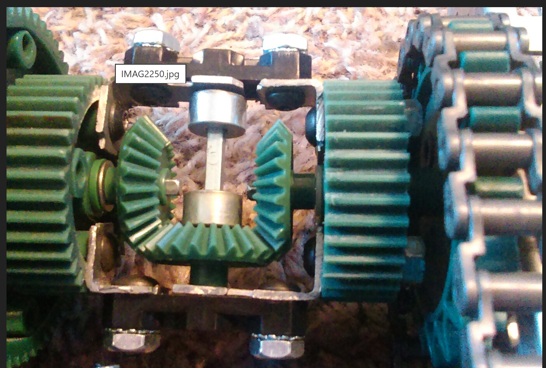 Automotive differential showing bevel gears meshing at 90 degrees